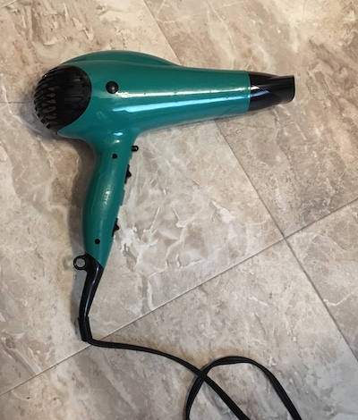 Use a hairdryer on a cool setting to help dry wet athletic shoes.