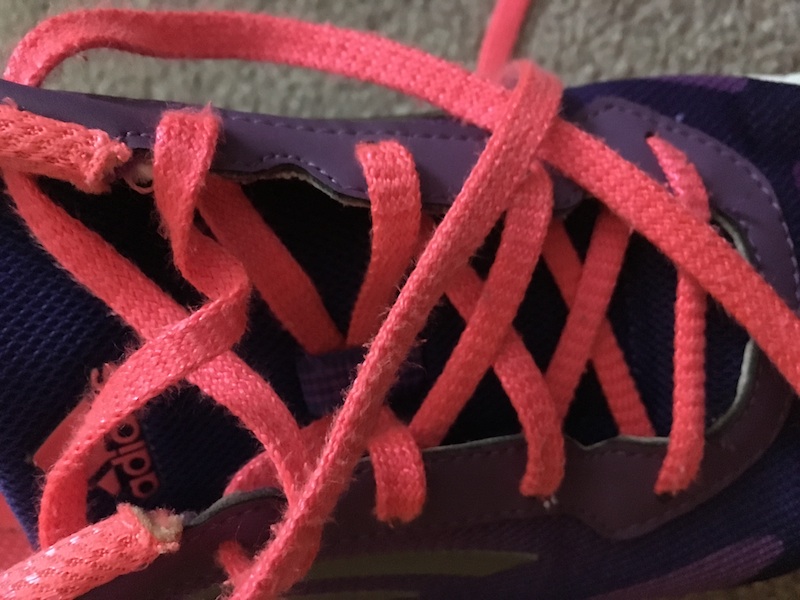 Athletic shoe laces can be round or flat.