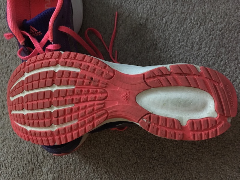 Athletic shoe features include the outsole of the shoe.
